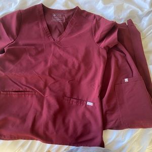 Figs matching burgundy set. Two pocket top with Yola bottoms